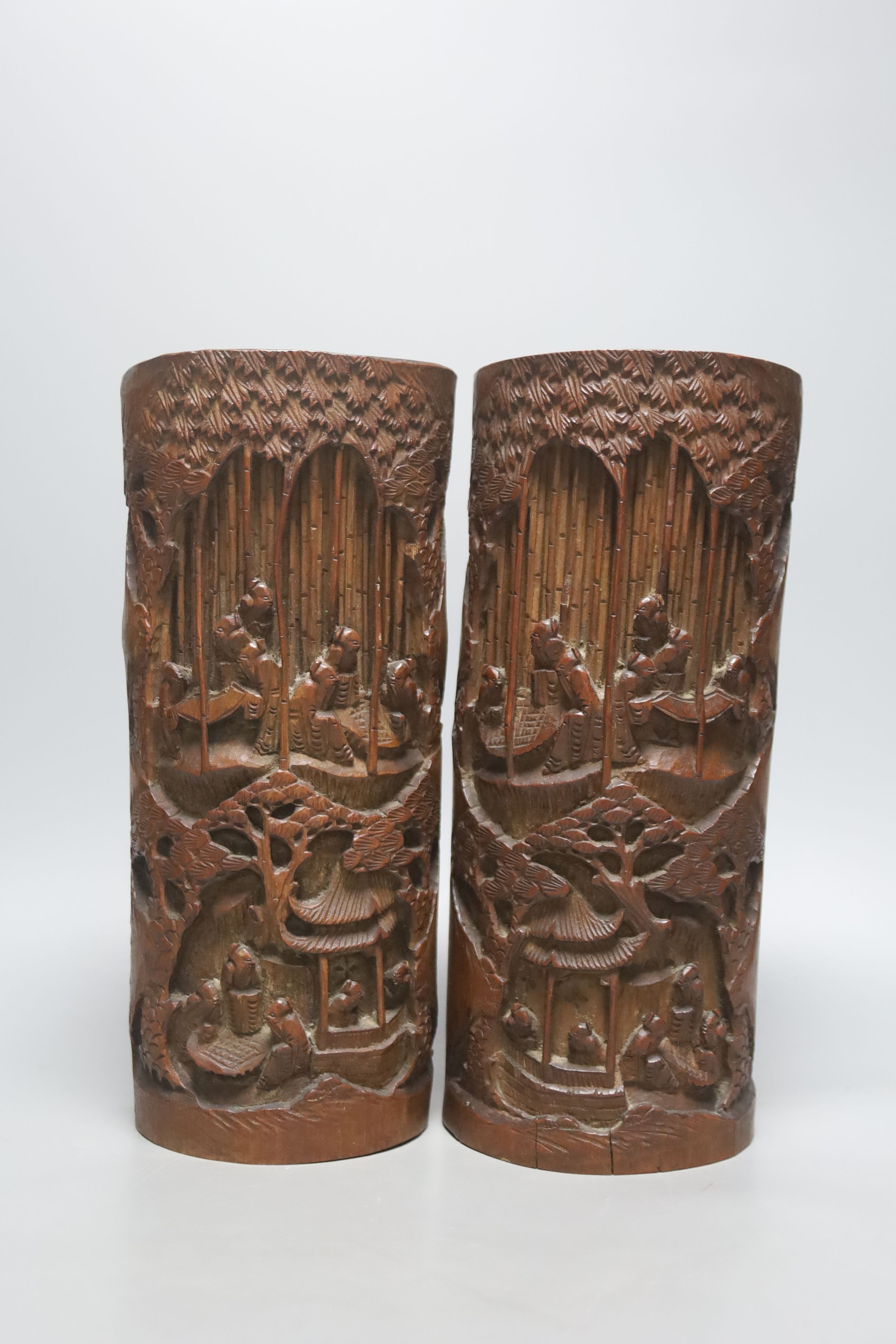 Four Chinese bamboo brushpots and a caddy, tallest brush pot 29 cms high.